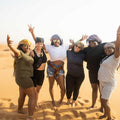Dubai Half-day Red Dunes bashing with Sandboarding, Camel &Falcon